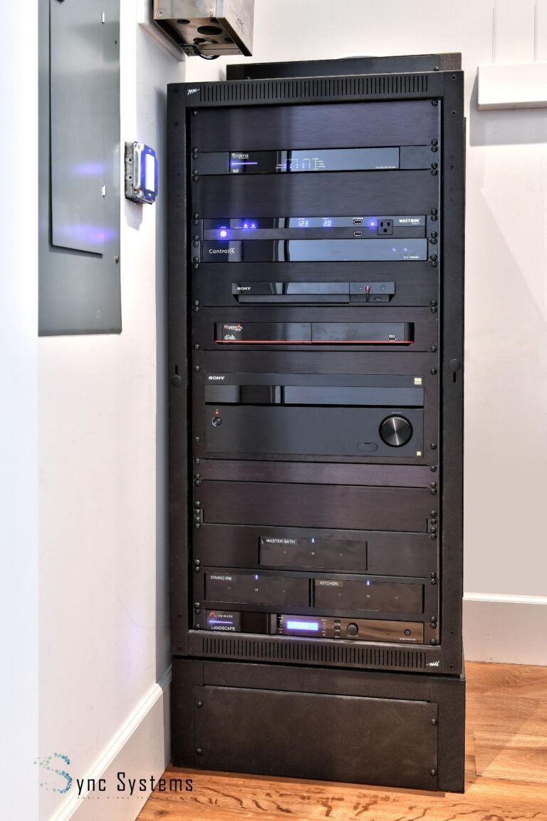 Home theater and AV automation server bank installed in a custom home.