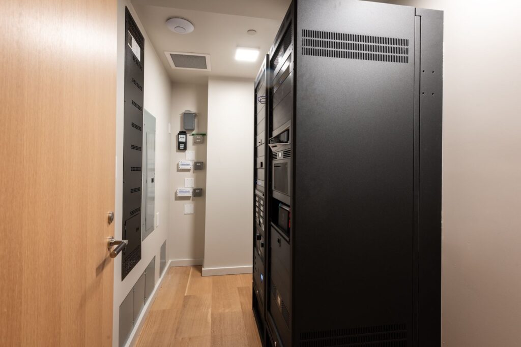 A view of the cabinet where all of the media for the home theater.