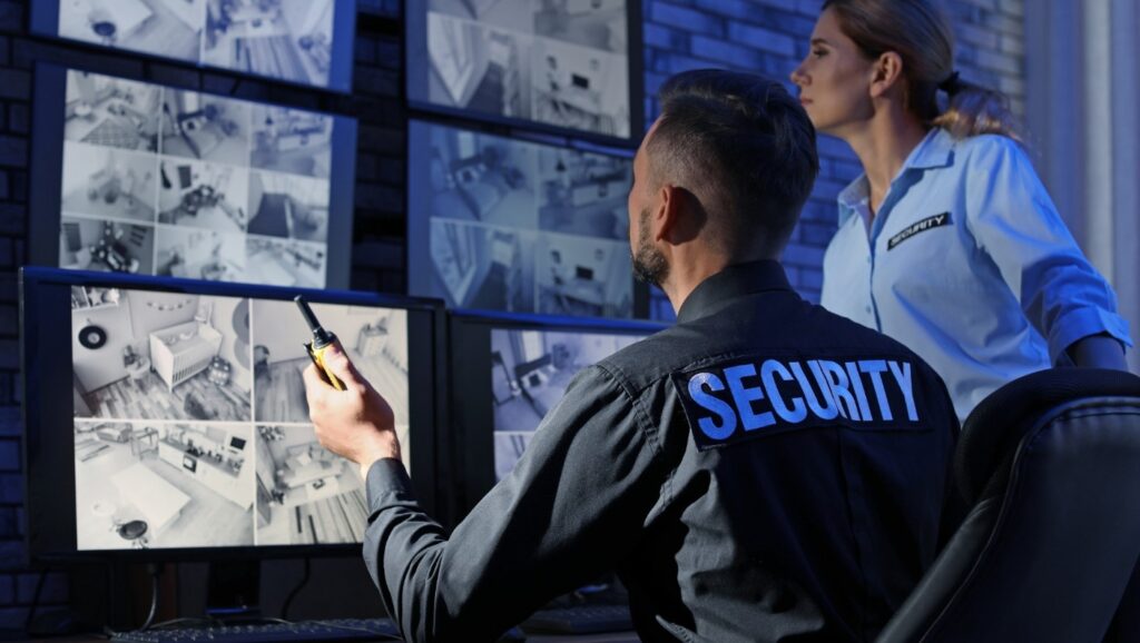 An office security team looks at security footage.