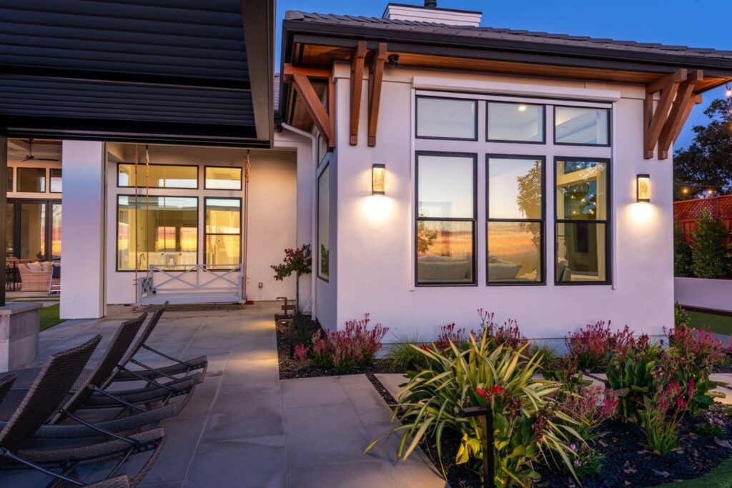 The window of a luxury home with the shades lifted.