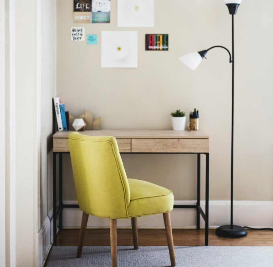 a chair next to a desk